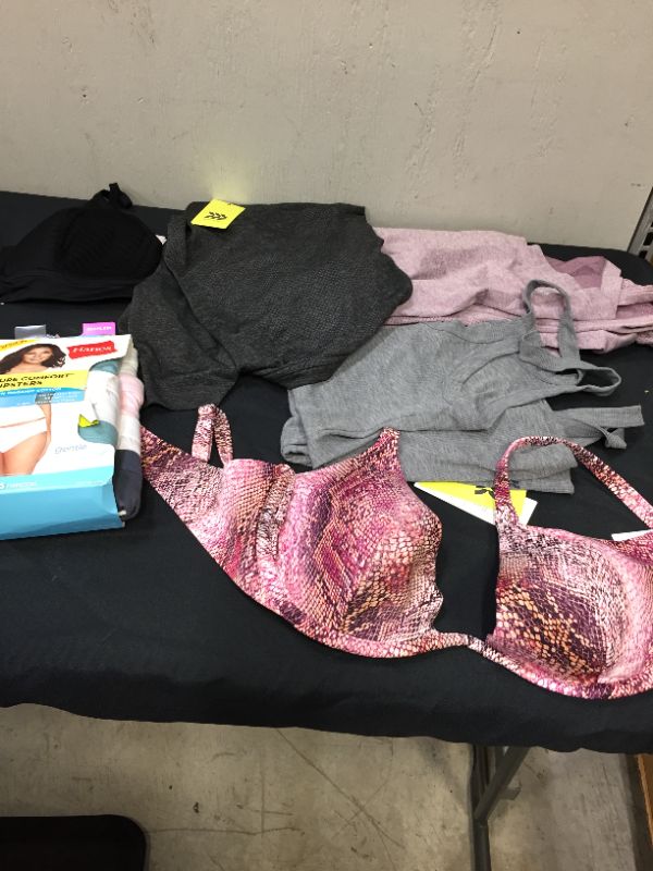 Photo 1 of bag lot of women's clothing different styles and sizes --sold as is --