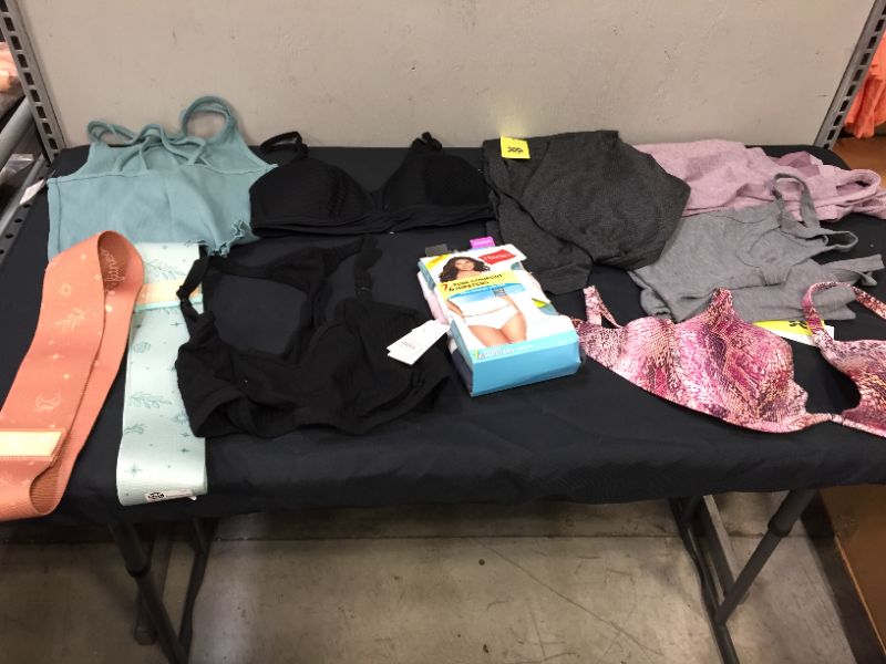 Photo 1 of bag lot of women's clothing different styles and sizes --sold as is --