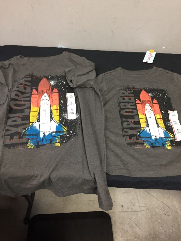 Photo 1 of BOYS SHORT SLEEVE ROCKET EXPLORER T-SHIRT SIZE XL AND XS 