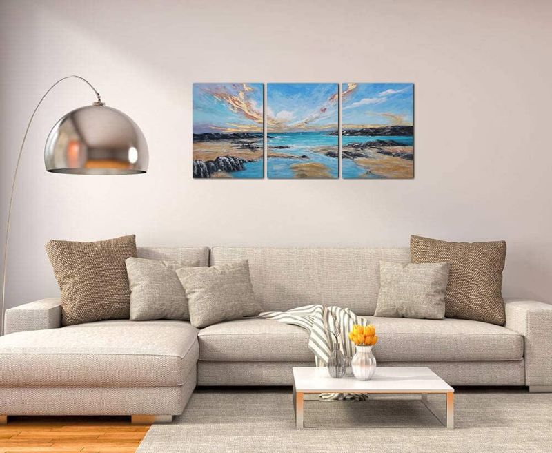 Photo 2 of Ardemy Blue Coastal Wall Art Bathroom Decor Seaside Rock Beach Abstract Pictures Beige Modern Landscape Painting, 12"x16"x3 Panels Framed Ready to Hang for Bedroom Living Room Home Office Wall Decor
