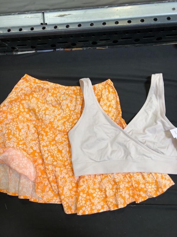 Photo 1 of 2 ITEM LOT SKIRT AND BRA 