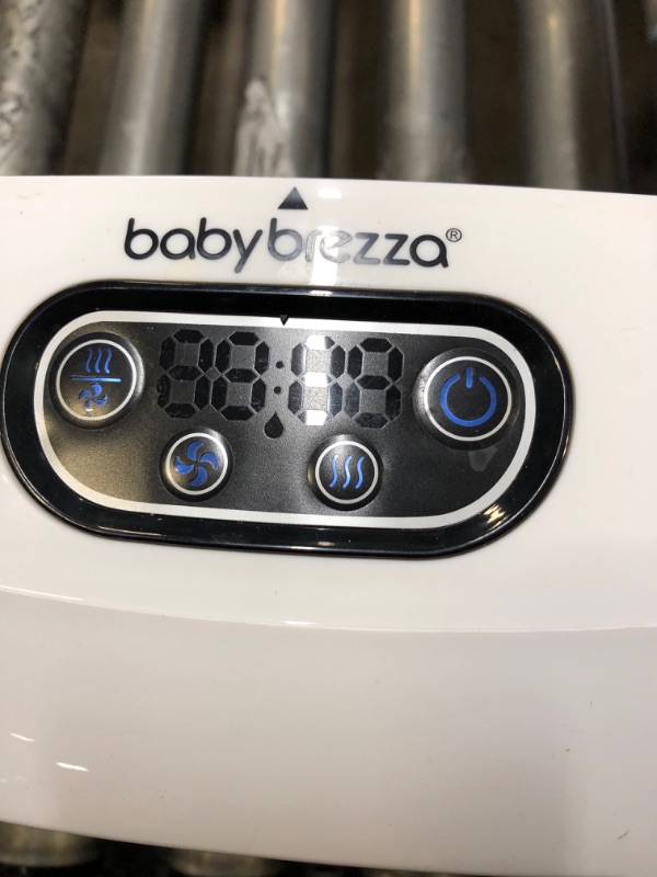 Photo 1 of Baby Brezza Baby Bottle Sterilizer and Dryer Advanced – Electric Steam Sterilization Machine – Universal Sterilizing for All Bottles: Plastic + Glass + Pacifiers + Breast Pump Parts - HEPA Filtration-------used needs cleaning

