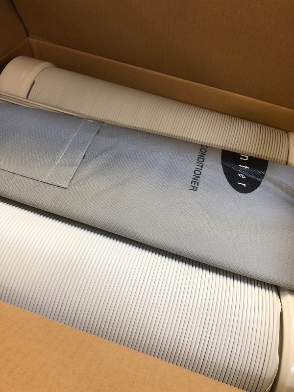 Photo 1 of 14,000 BTU Portable Air Conditioner with Dehumidifier and Remote