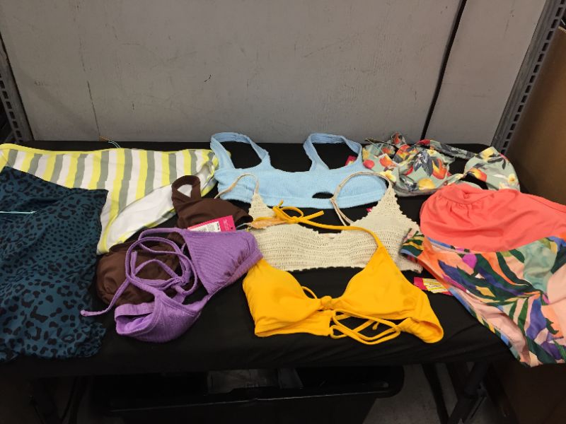 Photo 1 of BAG LOT OF WOMEN'S BIKINI'S DIFFERENT SIZE AND STYLES ---SOLD AS IS ---