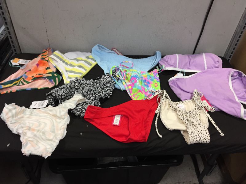 Photo 1 of BAG LOT OF WOMEN'S BIKINI'S DIFFERENT SIZE AND STYLES ---SOLD AS IS ---