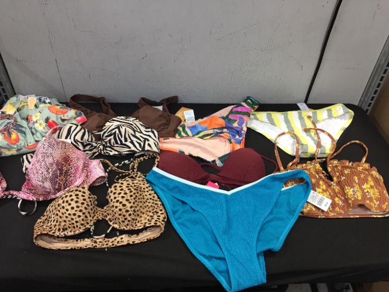 Photo 1 of BAG LOT OF WOMEN'S BIKINI'S DIFFERENT SIZE AND STYLES ---SOLD AS IS ---