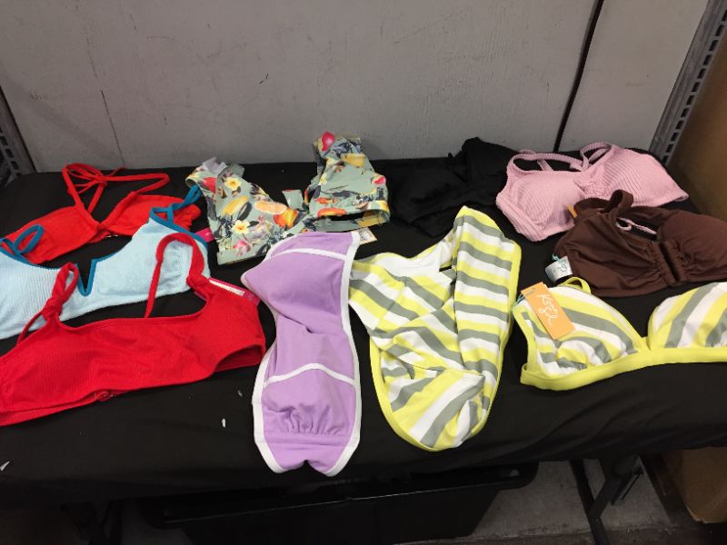 Photo 1 of BAG LOT OF WOMEN'S BIKINI'S DIFFERENT SIZE AND STYLES ---SOLD AS IS ---