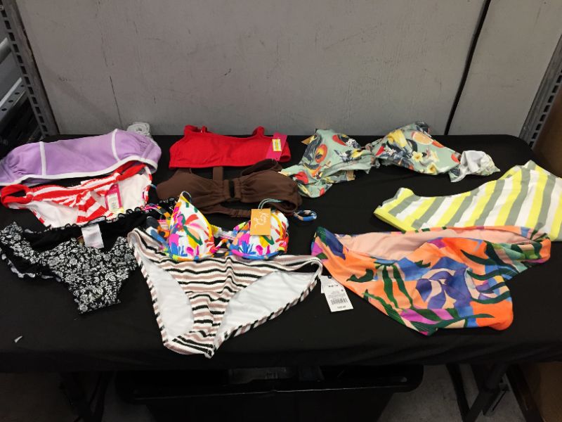 Photo 1 of BAG LOT OF WOMEN'S BIKINI'S DIFFERENT SIZE AND STYLES ---SOLD AS IS ---