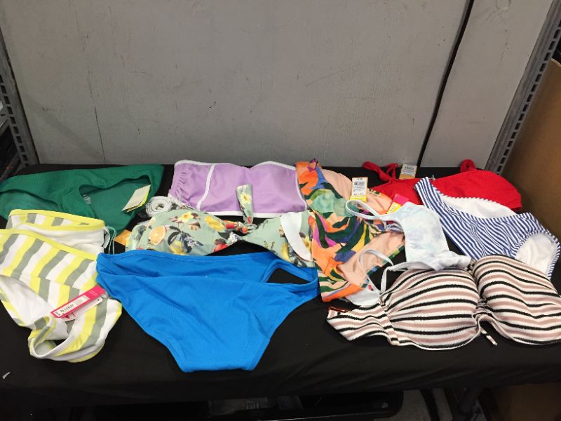 Photo 1 of BAG LOT OF WOMEN'S BIKINI'S DIFFERENT SIZE AND STYLES ---SOLD AS IS ---