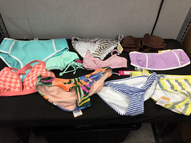 Photo 1 of BAG LOT OF WOMEN'S BIKINI'S DIFFERENT SIZE AND STYLES ---SOLD AS IS ---