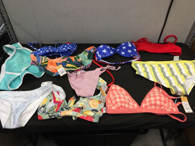 Photo 1 of BAG LOT OF WOMEN'S BIKINI'S DIFFERENT SIZE AND STYLES ---SOLD AS IS ---