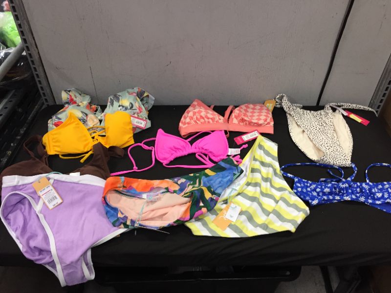 Photo 1 of BAG LOT OF WOMEN'S BIKINI'S DIFFERENT SIZE AND STYLES ---SOLD AS IS ---