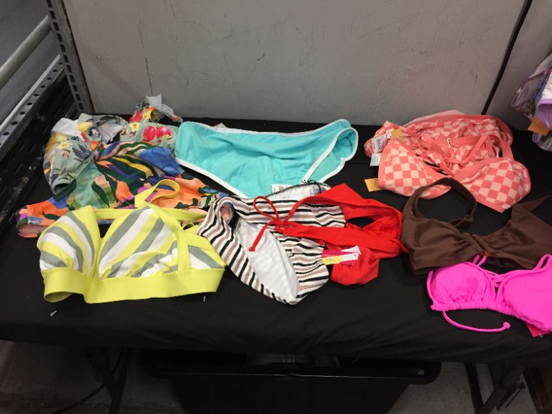 Photo 1 of BAG LOT OF WOMEN'S BIKINI'S DIFFERENT SIZE AND STYLES ---SOLD AS IS ---