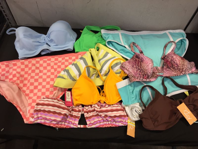 Photo 1 of BAG LOT OF WOMEN'S BIKINI'S DIFFERENT SIZE AND STYLES ---SOLD AS IS ---