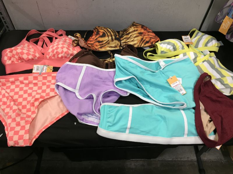 Photo 1 of BAG LOT OF WOMEN'S BIKINI'S DIFFERENT SIZE AND STYLES ---SOLD AS IS ---