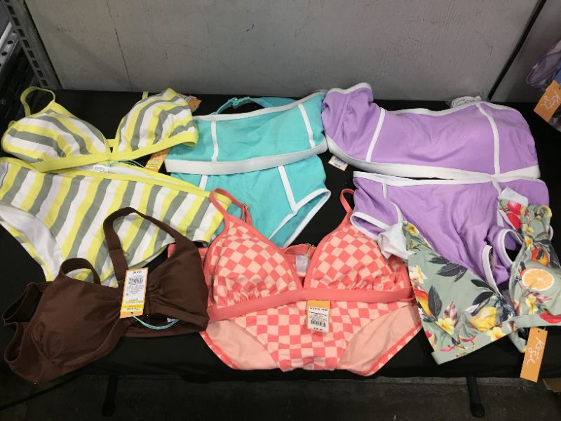 Photo 1 of BAG LOT OF WOMEN'S BIKINI'S DIFFERENT SIZE AND STYLES ---SOLD AS IS ---