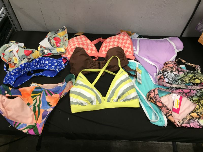 Photo 1 of BAG LOT OF WOMEN'S BIKINI'S DIFFERENT SIZE AND STYLES ---SOLD AS IS ---