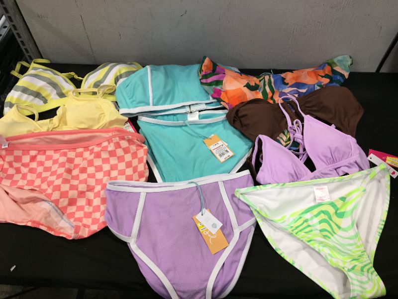 Photo 1 of BAG LOT OF WOMEN'S BIKINI'S DIFFERENT SIZE AND STYLES ---SOLD AS IS ---