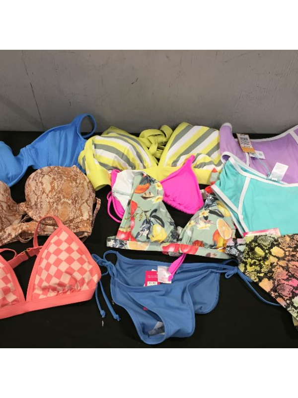 Photo 1 of BAG LOT OF WOMEN'S BIKINI'S DIFFERENT SIZE AND STYLES ---SOLD AS IS ---