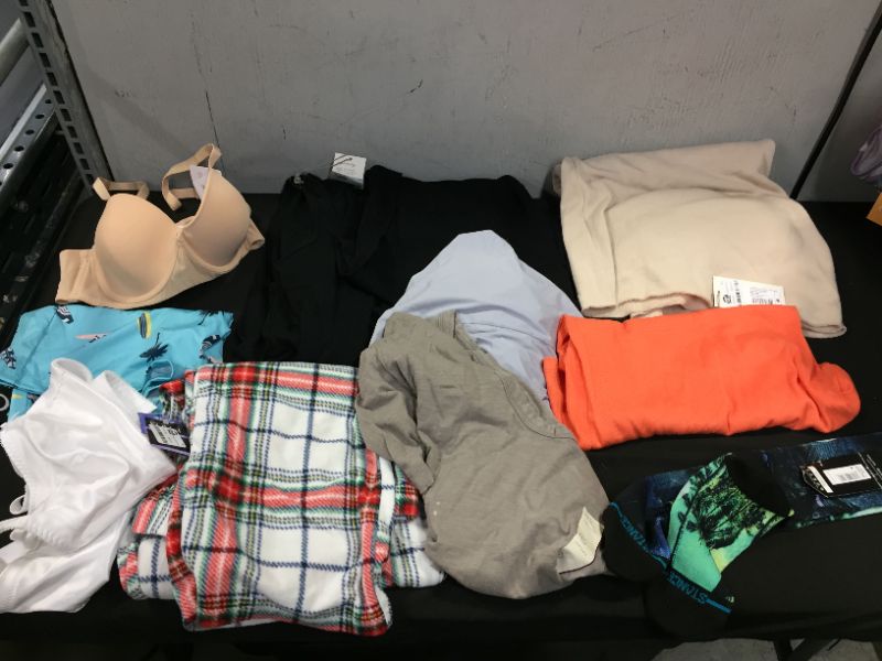 Photo 1 of BAG LOT OF CLOTHES DIFFERENT SIZES AND STYLES --SOLD AS IS ---