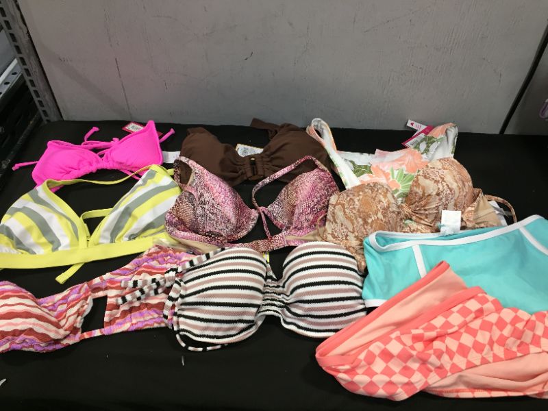 Photo 1 of BAG LOT OF WOMEN'S BIKINI'S DIFFERENT SIZE AND STYLES ---SOLD AS IS ---