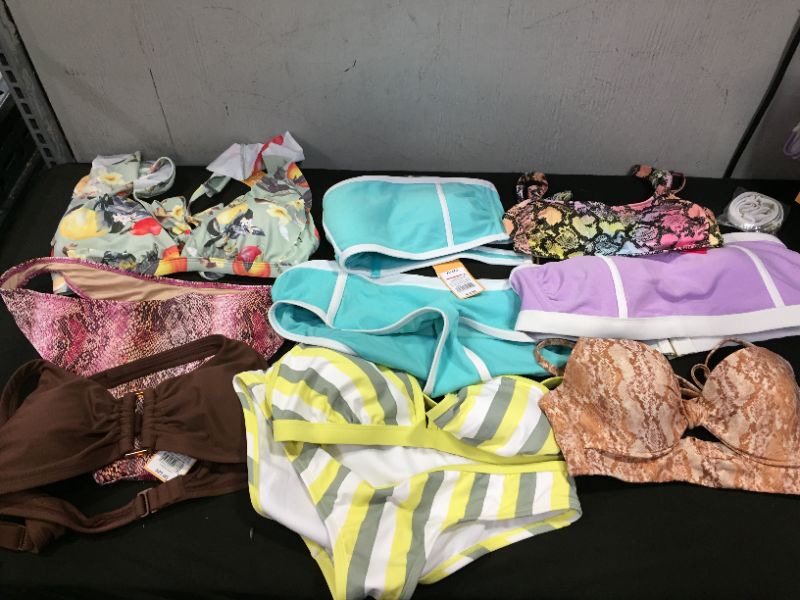 Photo 1 of BAG LOT OF WOMEN'S BIKINI'S DIFFERENT SIZE AND STYLES ---SOLD AS IS ---