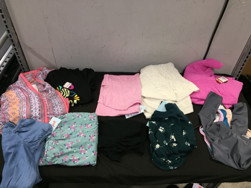 Photo 1 of BAG LOT OF GIRL'S CLOTHING DIFFERENT SIZES AND STYLES --SOLD AS IS --