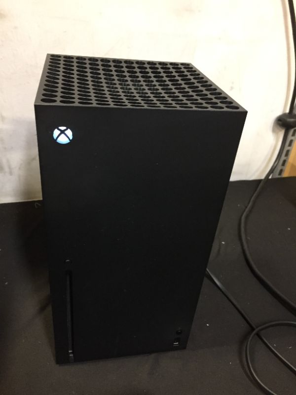 Photo 2 of Xbox Series X (ITEM IS USED, STILL IN GREAT CONDITION, MISSING MANUAL)