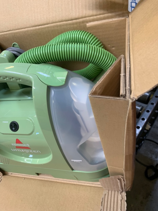 Photo 4 of Bissell Multi-Purpose Portable Carpet and Upholstery Cleaner, 1400B, Green, Box Packaging Damaged, Moderate Use, Scratches and Scuffs on item
