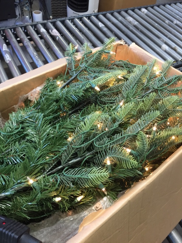 Photo 1 of 7.5 ft. Aspen Fir Artificial Christmas Tree with 700 Warm White Lights