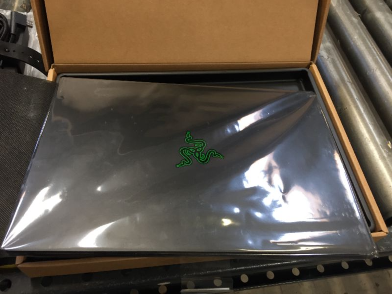 Photo 1 of Razer - Blade 14- 14" Gaming Laptop- QHD 165Hz- AMD Ryzen 9 5900HX- NVIDIA GeForce RTX 3080- 16GB RAM- 1TB SSD - Black MINOR USE, TURNS ON AND GOES THROUGH INSTALL PROCESS 
