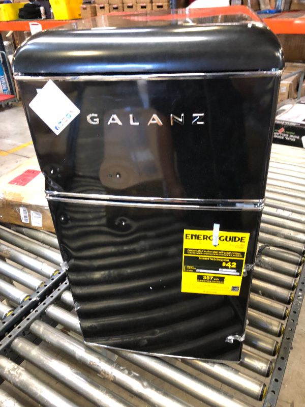 Photo 2 of Galanz Retro Compact Mini Fridge with Freezer, ** FOR PARTS, DOES NOT GET COLD ** MULTIPLE DENTS 2-Door, Energy Efficient, Small Refrigerator for Dorm, Office, Bedroom, 3.1 cu ft, Black
