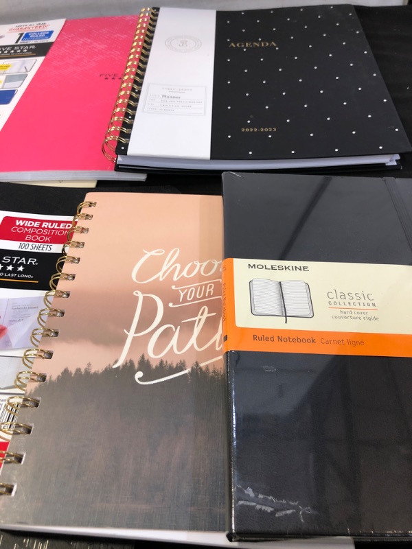 Photo 1 of MISC LOT OF NOTEBOOKS VARIOUS SIZES WITH A BONUS PLANNER 2022-2023