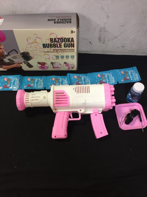 Photo 2 of Bazooka Bubble Gun Machine - Automatic Bubble Machine Toy Gun for Kids, Bubble Maker with 4 Bottles of Solution, Rechargeable Battery - Pink & White by.