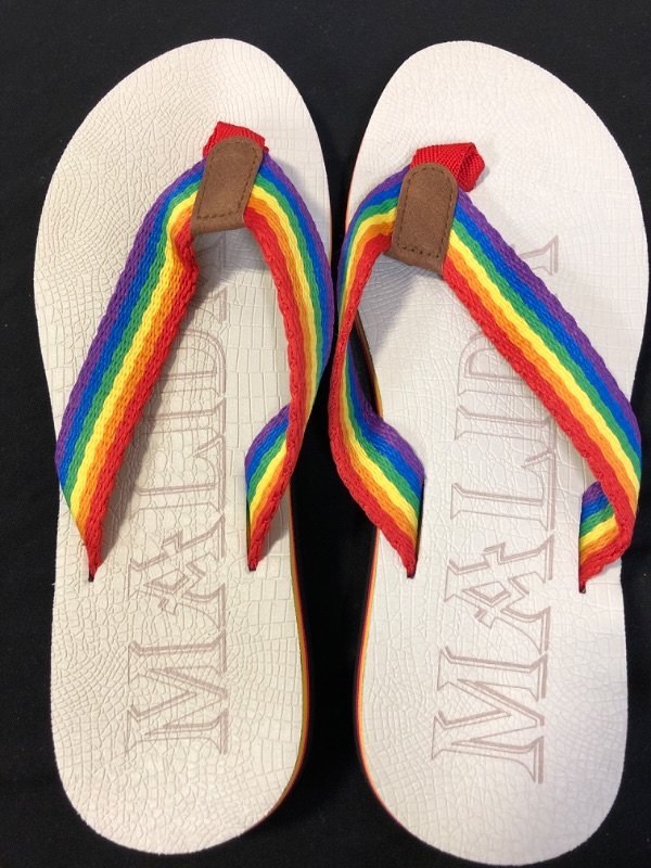 Photo 1 of WOMENS RAINBOW FLIP FLOPS WITH ARCH SUPPORT  SIZE 7