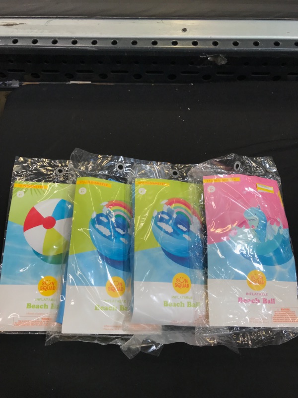 Photo 1 of 4 PACK OF INFLATABLE BEACH BALLS