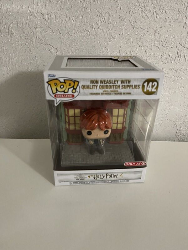 Photo 1 of Funko POP! Deluxe Ron Weasley with Quality Quidditch Supplies #142

