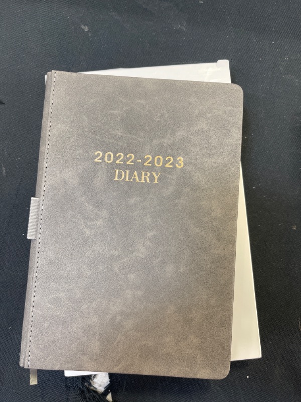 Photo 2 of 2022-2023 Daily Planner, Appointment Book 5-3/4" x 8-1/2", July 2022 - June 2023 , Daily Planner with Monthly Tabs, Inner Pocket/Pen Loop/Banded/Bookmarks