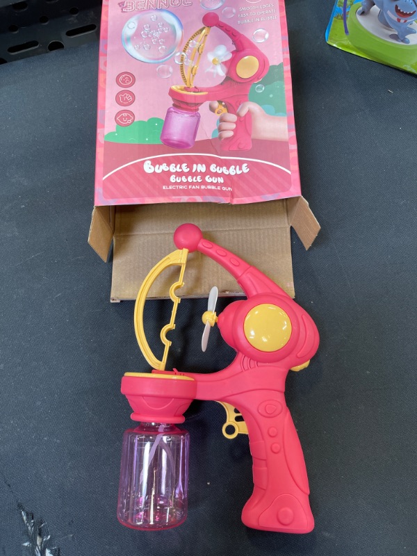 Photo 2 of Bennol Bubble Machine Gun for Girls Kids, Automatic Bubble Gun Blower Maker Bubbles in Bubble Machine Gun for Toddlers Girls, Summer Indoor Outdoor Party Gift Toy for 3 4 5 6 Years Old Pink
