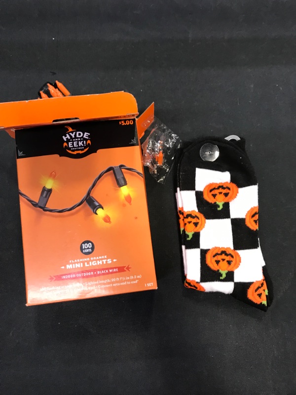Photo 3 of 100ct Incandescent Halloween Mini String Lights Flashing Orange - Hyde & EEK! Boutique
with Halloween socks