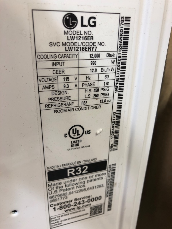 Photo 1 of 12,000 BTU 115-Volt Window Air Conditioner LW1216ER Cools 550 Sq. Ft. with ENERGY STAR and Remote - extreme damage to front 