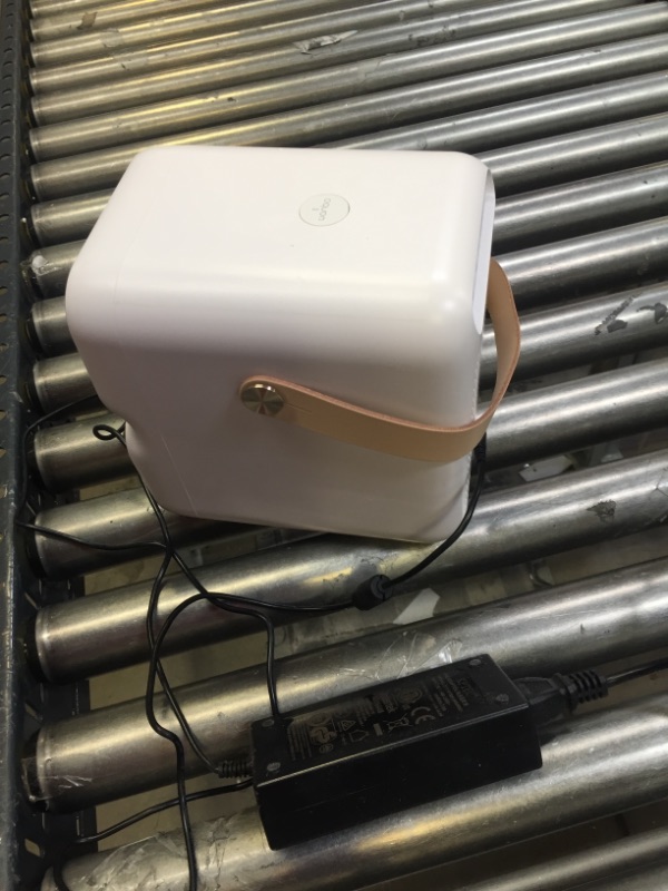 Photo 1 of POKITTER Orca 1080P Projector with WiFi and Bluetooth----MINOR SCRAPES. FULLY FUNCTIONAL