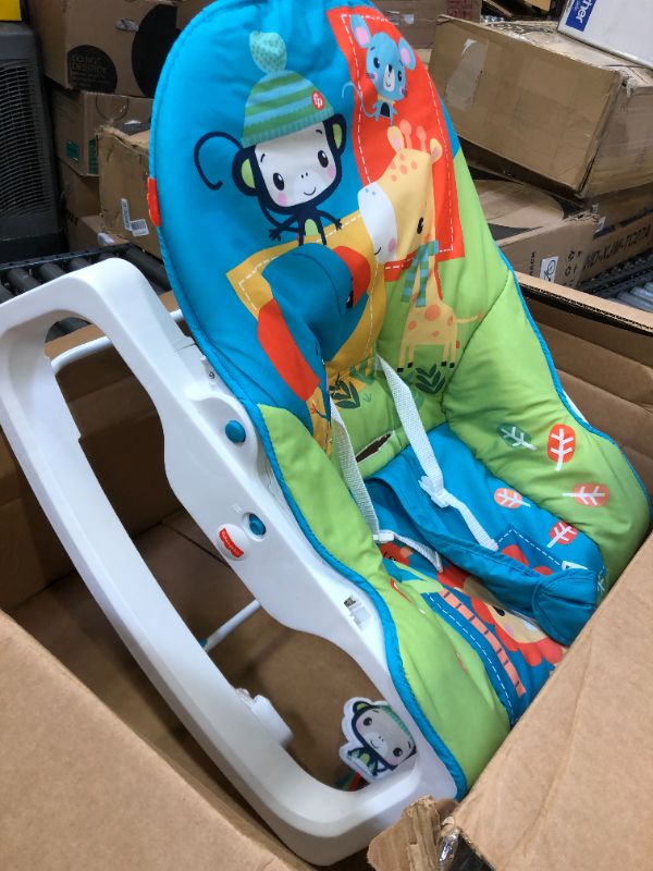 Photo 2 of ?Fisher-Price Infant-to-Toddler Rocker – Colorful Jungle, baby rocking chair with toys for soothing or playtime from infant to toddler
