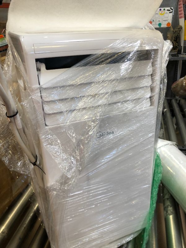 Photo 7 of Midea 6,000 BTU ASHRAE (5,000 BTU SACC) Portable Air Conditioner, Cools up to 150 Sq. Ft., Works as Dehumidifier & Fan, Remote Control & Window Kit Included---one of the adapters is very dirty view pictures 
