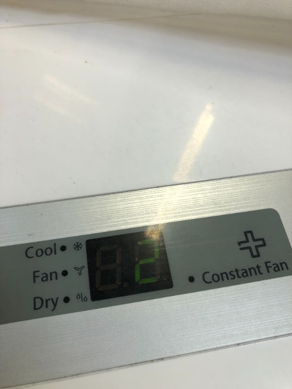 Photo 1 of Midea 6,000 BTU ASHRAE (5,000 BTU SACC) Portable Air Conditioner, Cools up to 150 Sq. Ft., Works as Dehumidifier & Fan, Remote Control & Window Kit Included---one of the adapters is very dirty view pictures 
