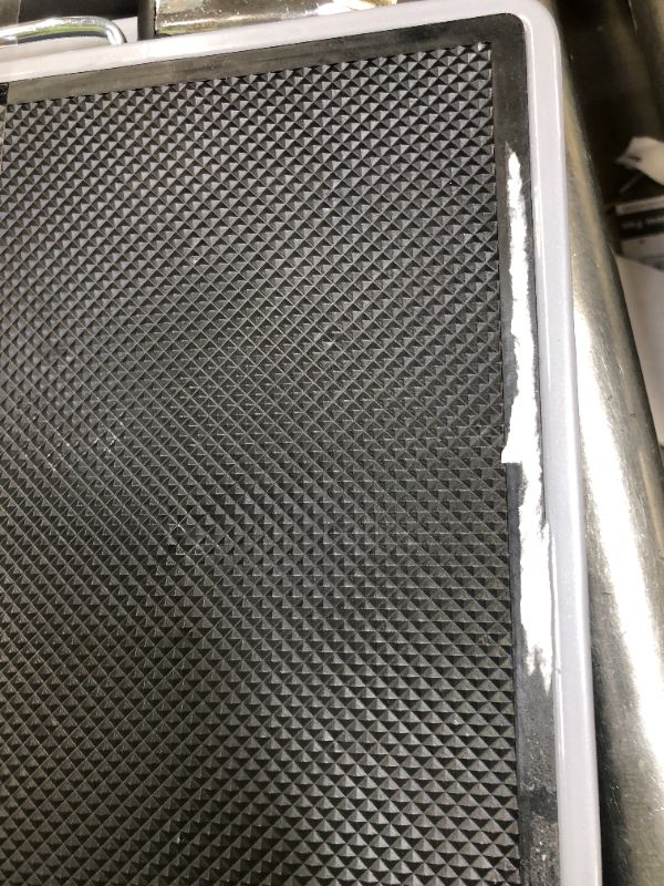 Photo 1 of 2 STEP LADDER ---THERE IS SOME DAMAGE TO THE STEPS 