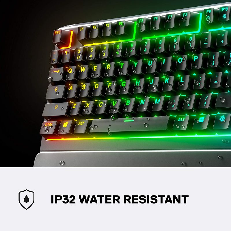 Photo 1 of SteelSeries Apex 3 RGB Gaming Keyboard – 10-Zone RGB Illumination – IP32 Water Resistant – Premium Magnetic Wrist Rest (Whisper Quiet Gaming Switch)
