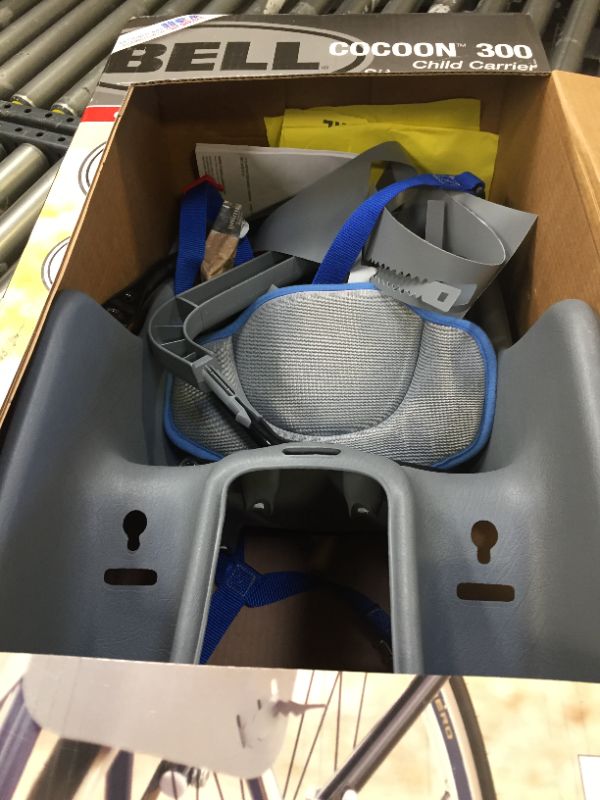 Photo 3 of Bell Front and Rear Child Bike Seats-----used and hardware is loose in the box 
