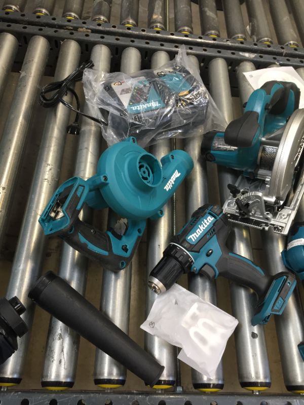 Photo 8 of Makita XT801X1 18V LXT Lithium-Ion Cordless 8-Pc. Combo Kit (3.0Ah)-------98percent of the items are brand new there are some scratches on the skill saw other then that everything is new ----seems like a person used the saw once then returned the item  
