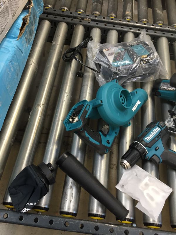 Photo 6 of Makita XT801X1 18V LXT Lithium-Ion Cordless 8-Pc. Combo Kit (3.0Ah)-------98percent of the items are brand new there are some scratches on the skill saw other then that everything is new ----seems like a person used the saw once then returned the item  
